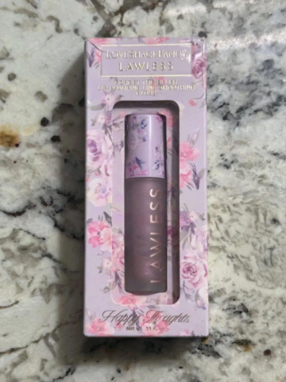 Lawless x lock shack fancy sparkly limp plumping gloss